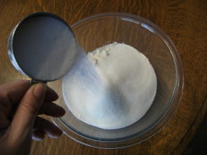 making a sheet cake - sugar and flour