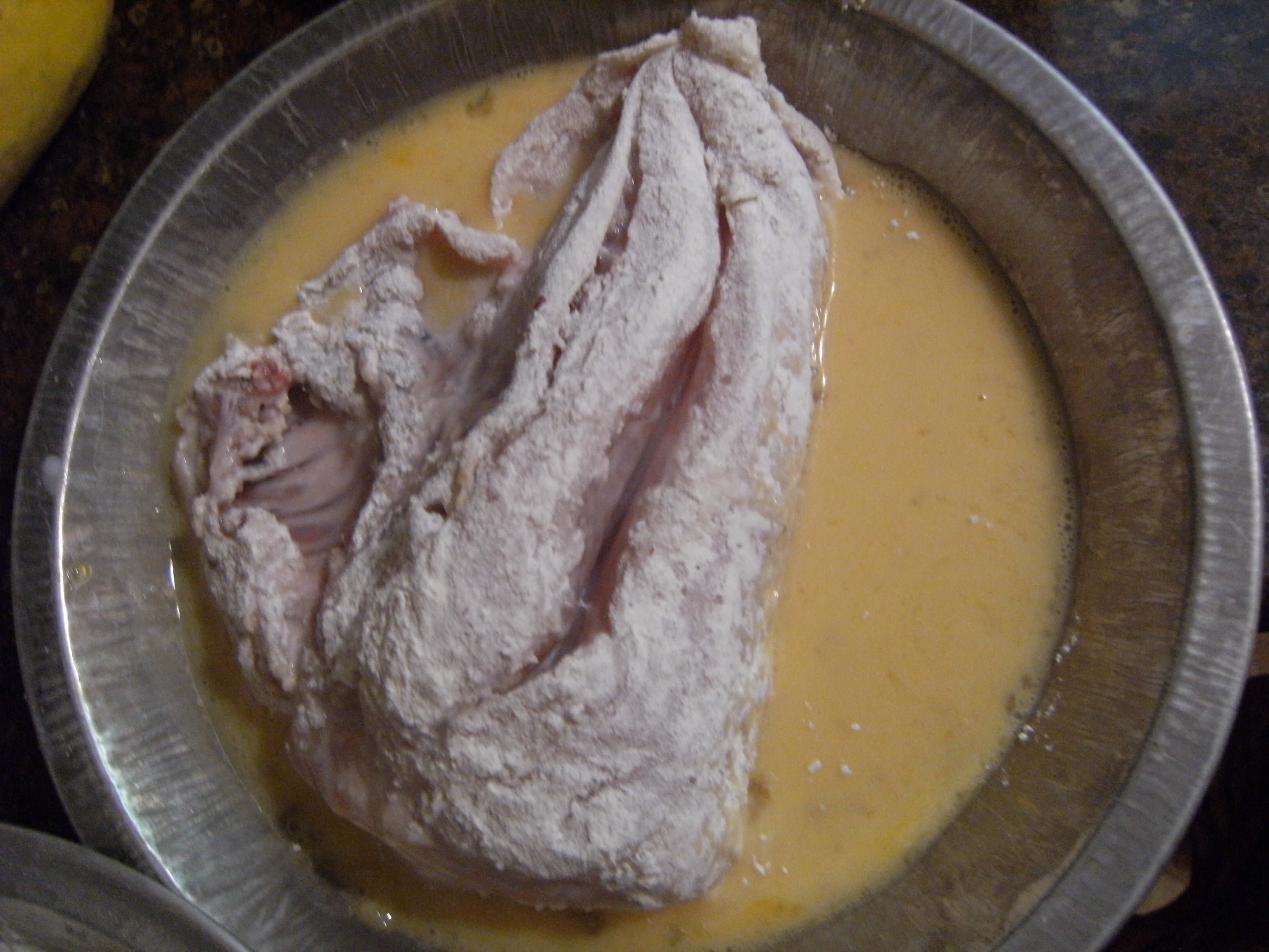 coating chicken breast with an egg wash