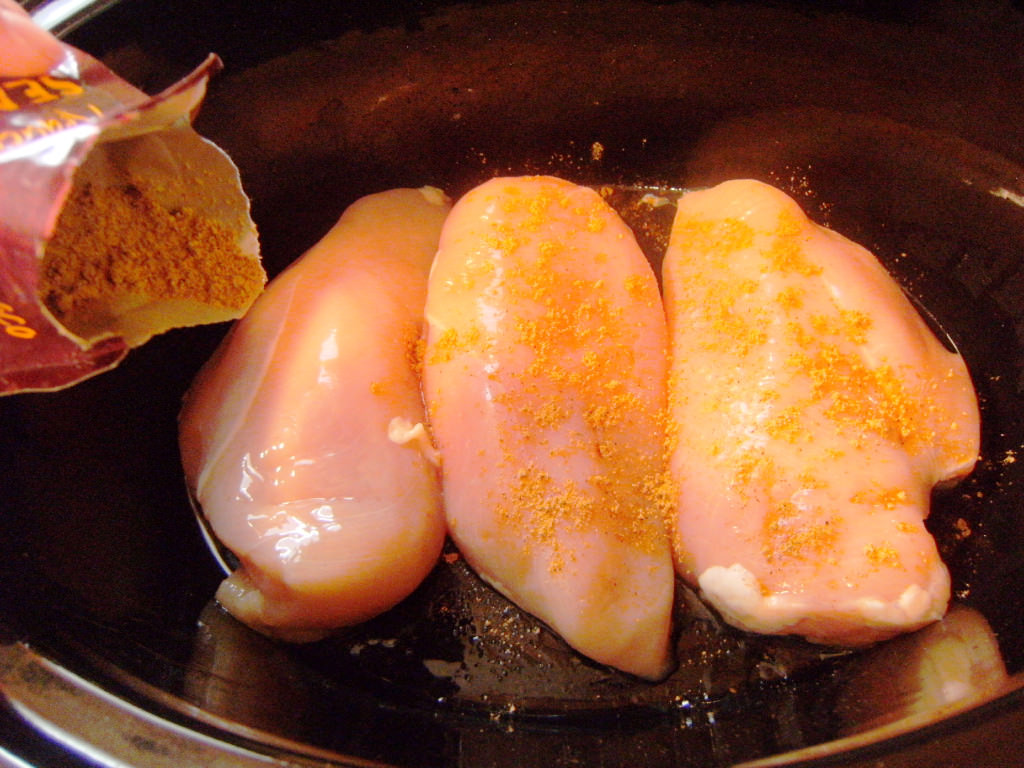 chicken breasts used to make shredded chicken tacos in a slow cooker