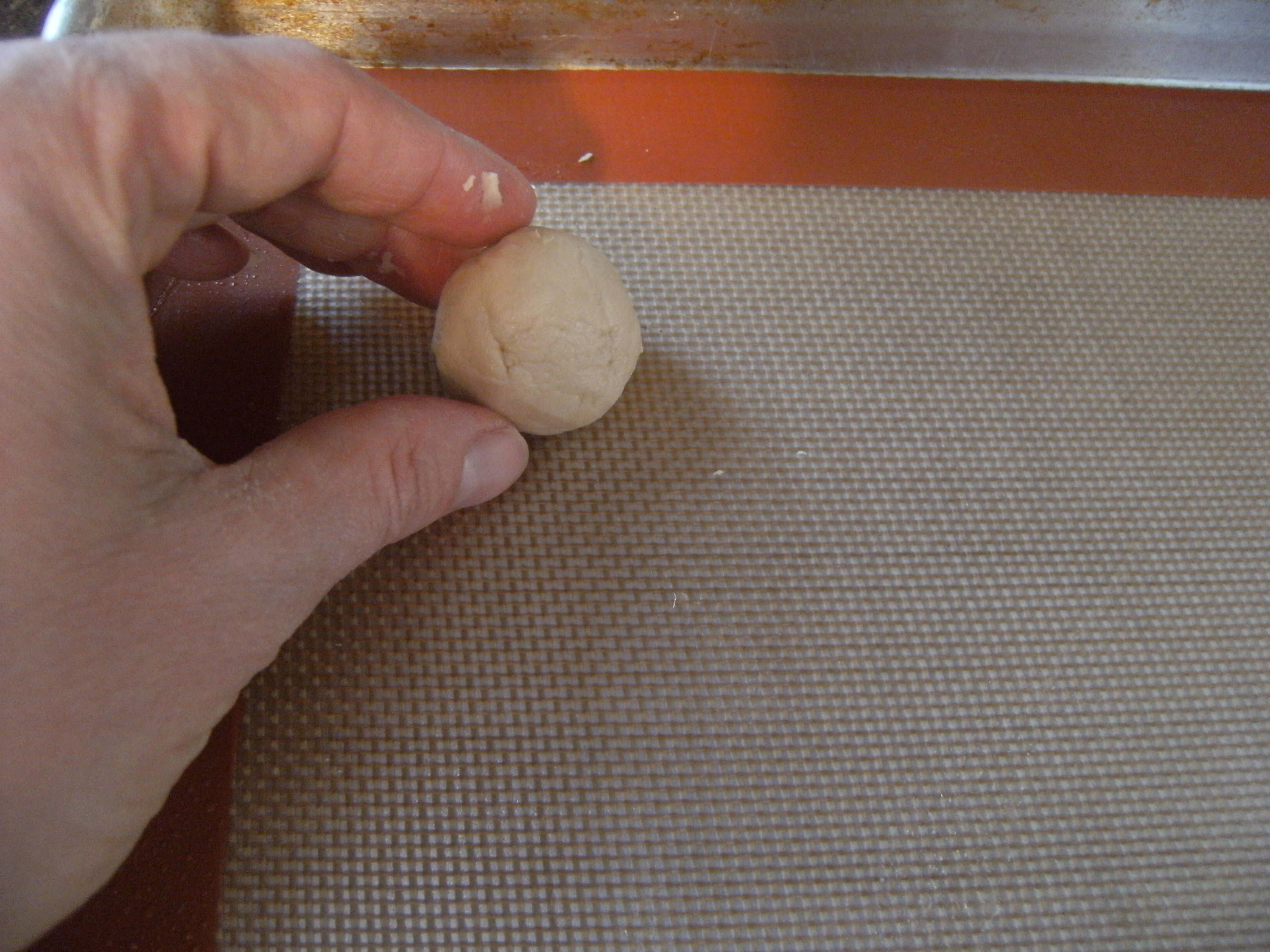 A ball of pfeffernusse cookie dough