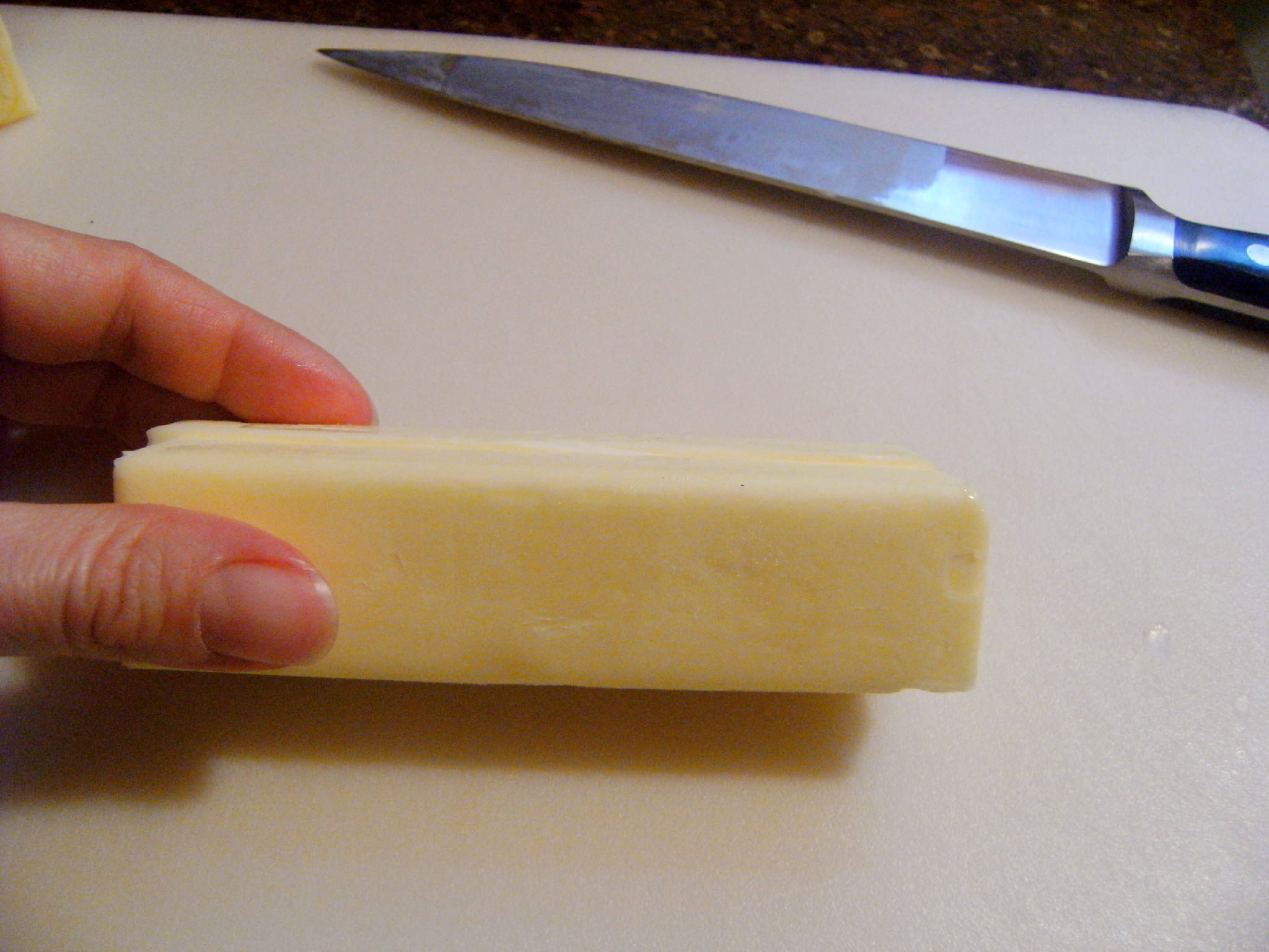 stick of butter, cut in half lengthwise