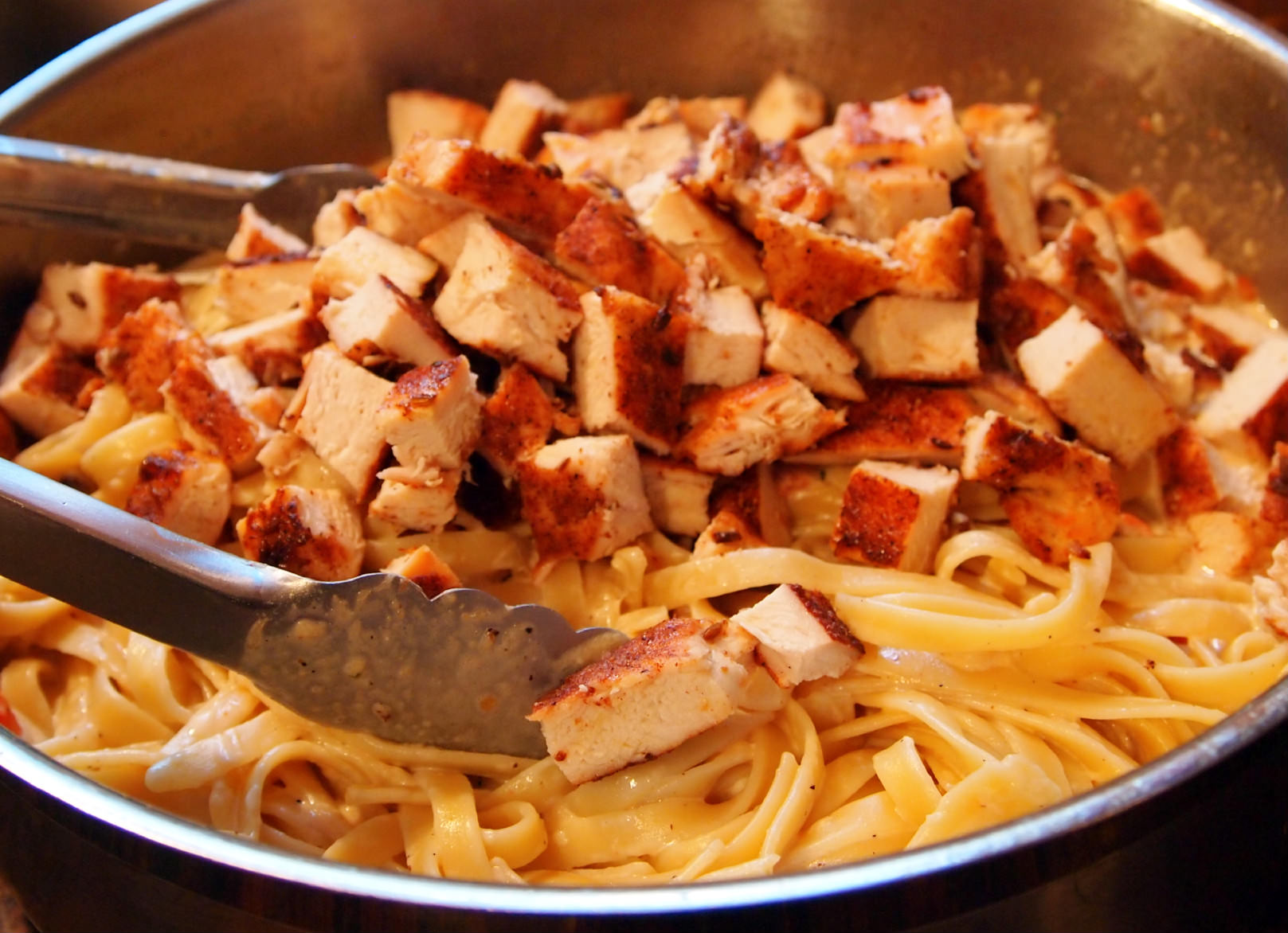 Cajun-Chicken-Fettuccine-Alfredo is a perfect meal for date night. The spicy chicken and rich cream sauce makes eating a restaurant quality meal a reality.