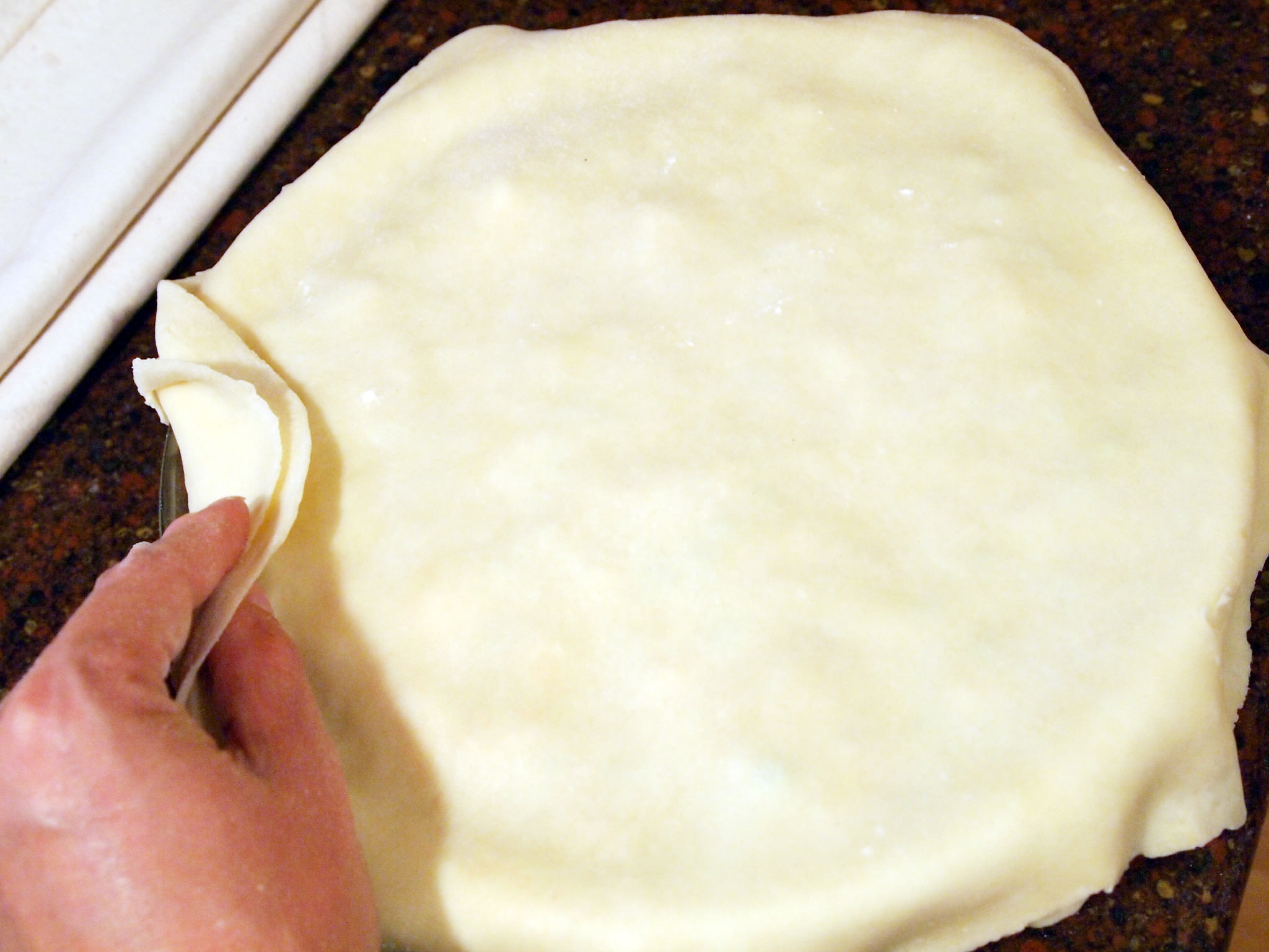 forming the crust of a chicken pot pie