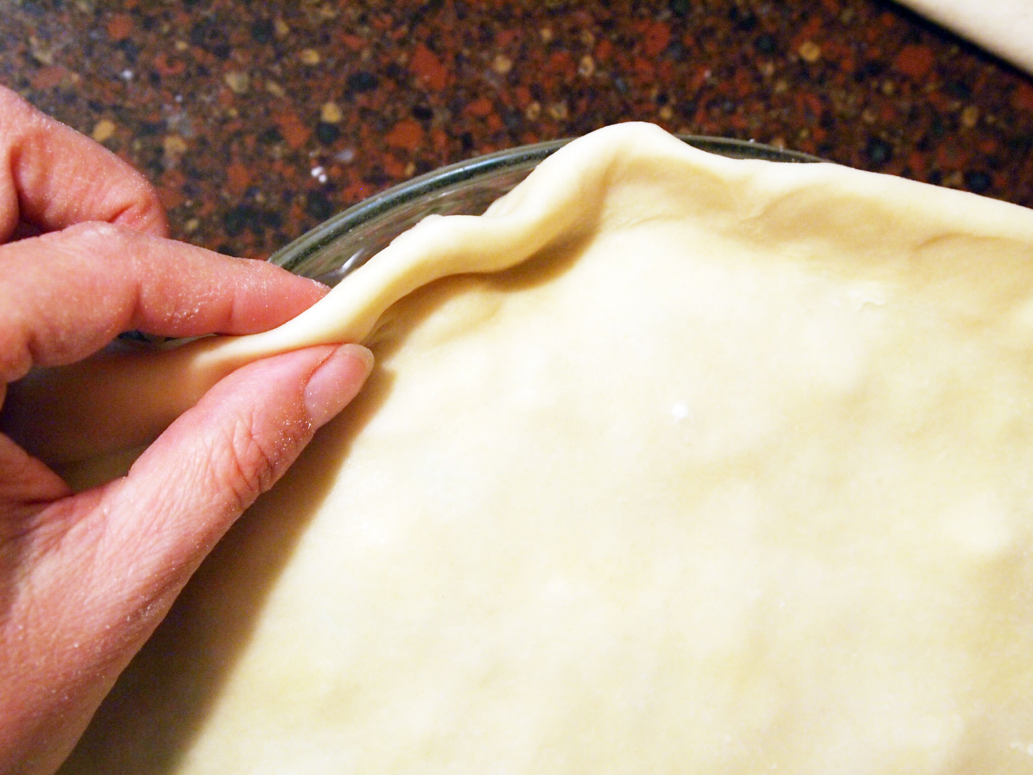 forming a pie crust requires light fingers