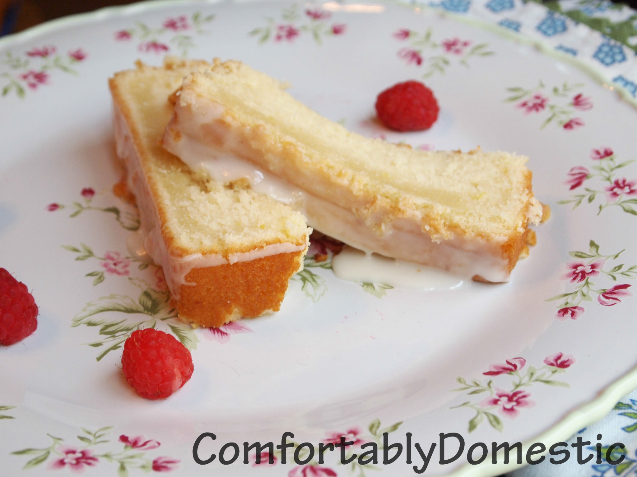Iced lemon loaf is the perfect treat with a cup of coffee. Now there's no need to get it at the local coffee shop, because you can make it at home for a fraction of the cost! | ComfortablyDomestic.com