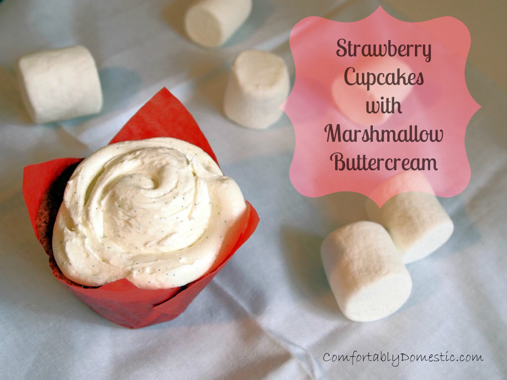 Strawberry cupcakes with marshmallow buttercream are moist strawberry-sweetened cupcakes topped with fluffy marshmallow buttercream frosting. | ComfortablyDomestic.com