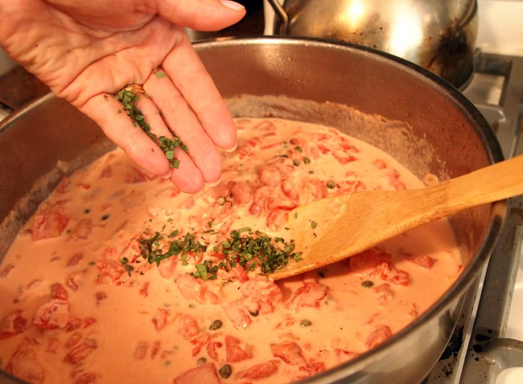 making sauce for Tuscan crepes | ComfortablyDomestic.com