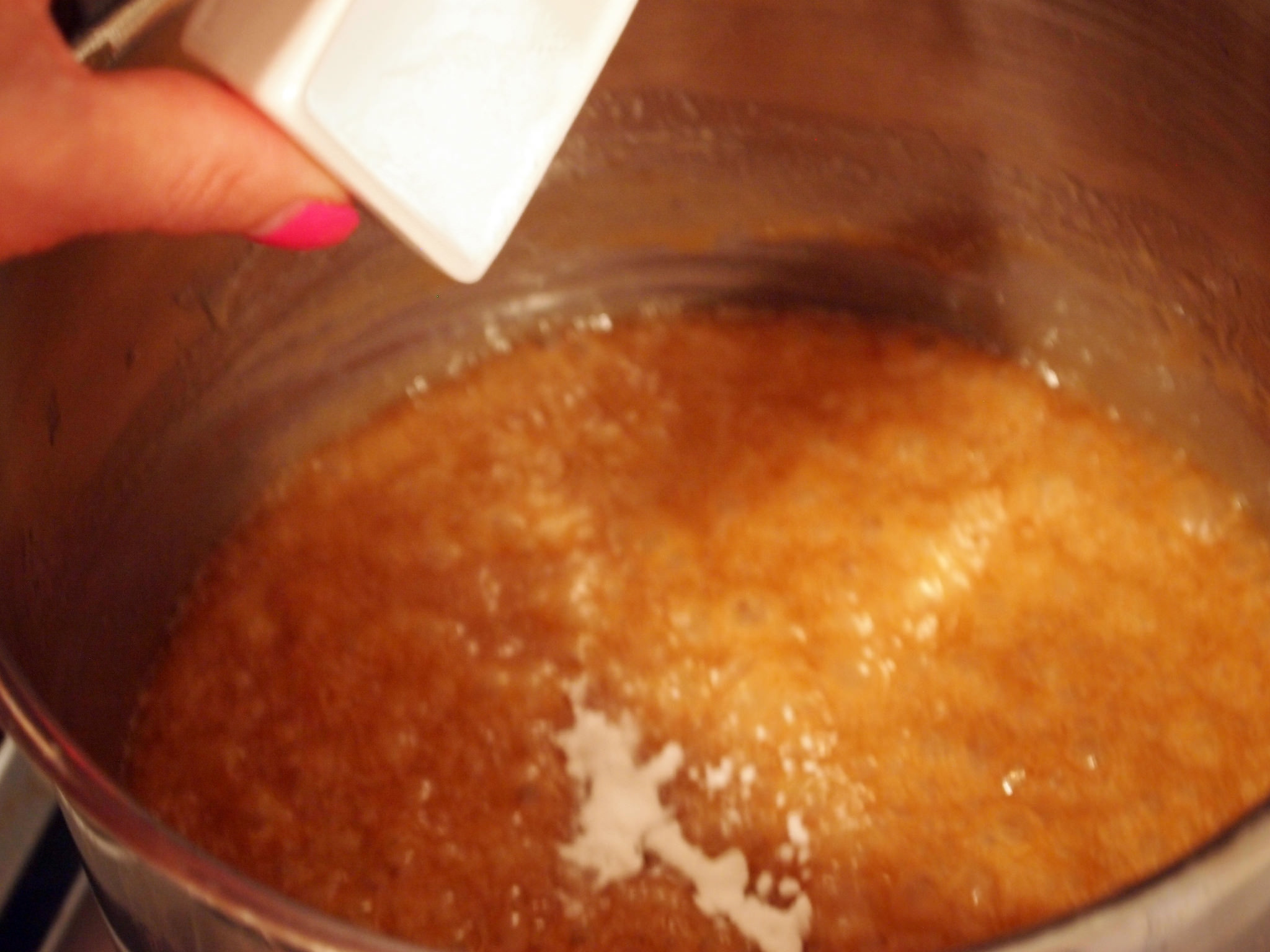 baking soda reacting to caramel mixture