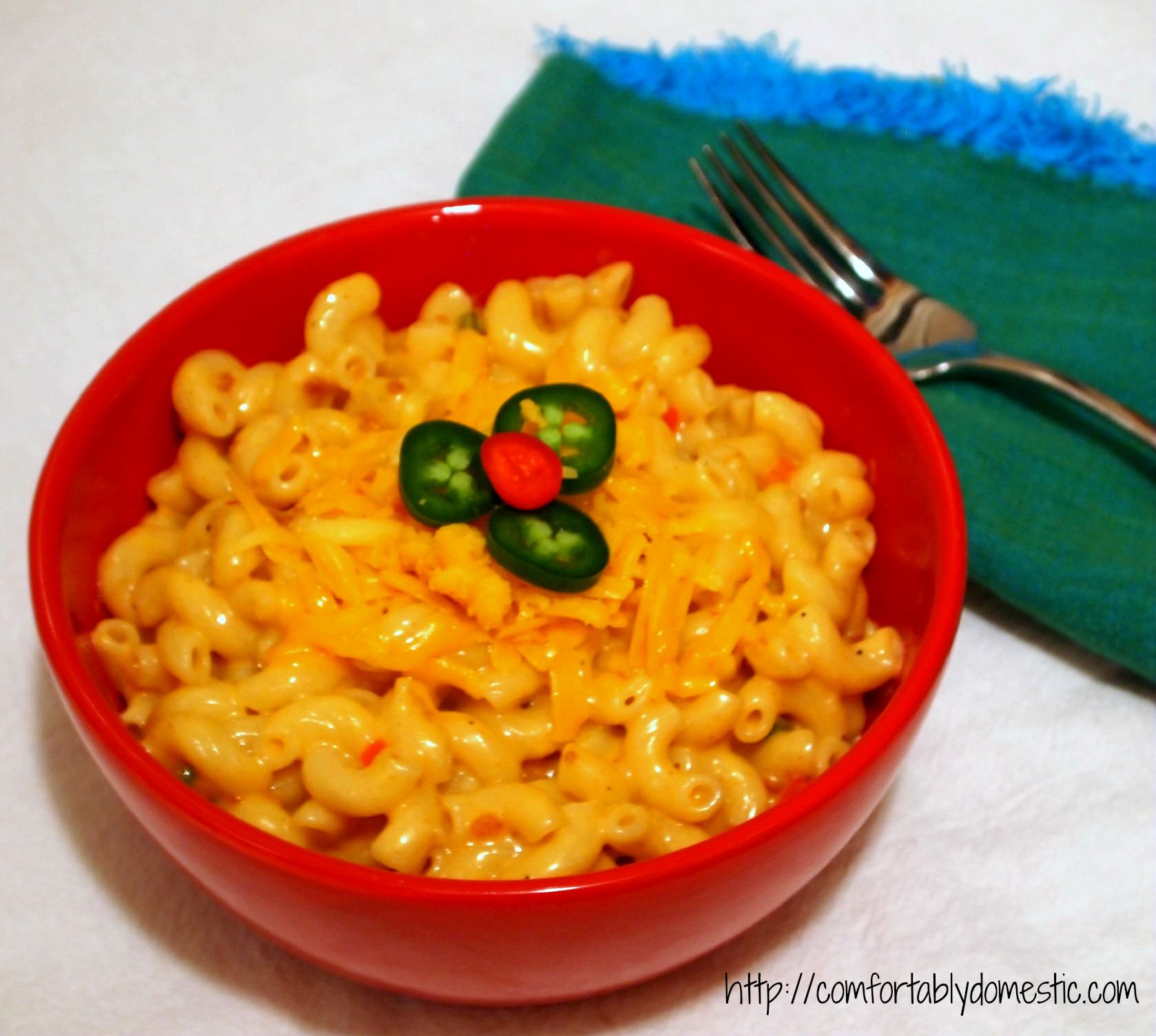 Queso macaroni and cheese is tender macaroni, drenched in a creamy Wisconsin cheese sauce, peppered with all the flavors of a queso dip. | Comfortably Domestic