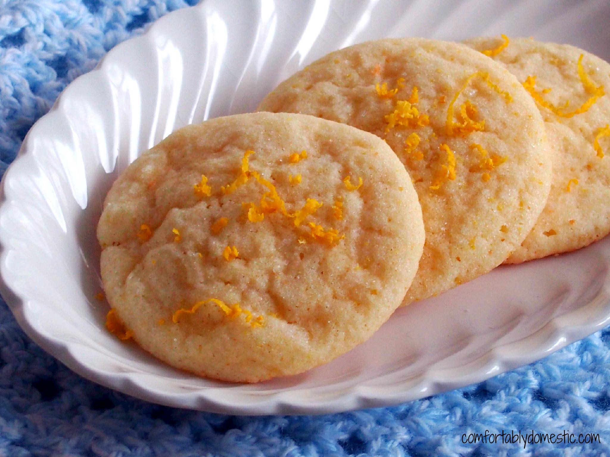 Lemon Doodles are the perfect balance between a chewy, light lemon cookie and soft lemon cake. Tangy and sweet, with a crunchy lemon sugar topping, these cookies are the ultimate treat! | ComfortablyDomestic.com