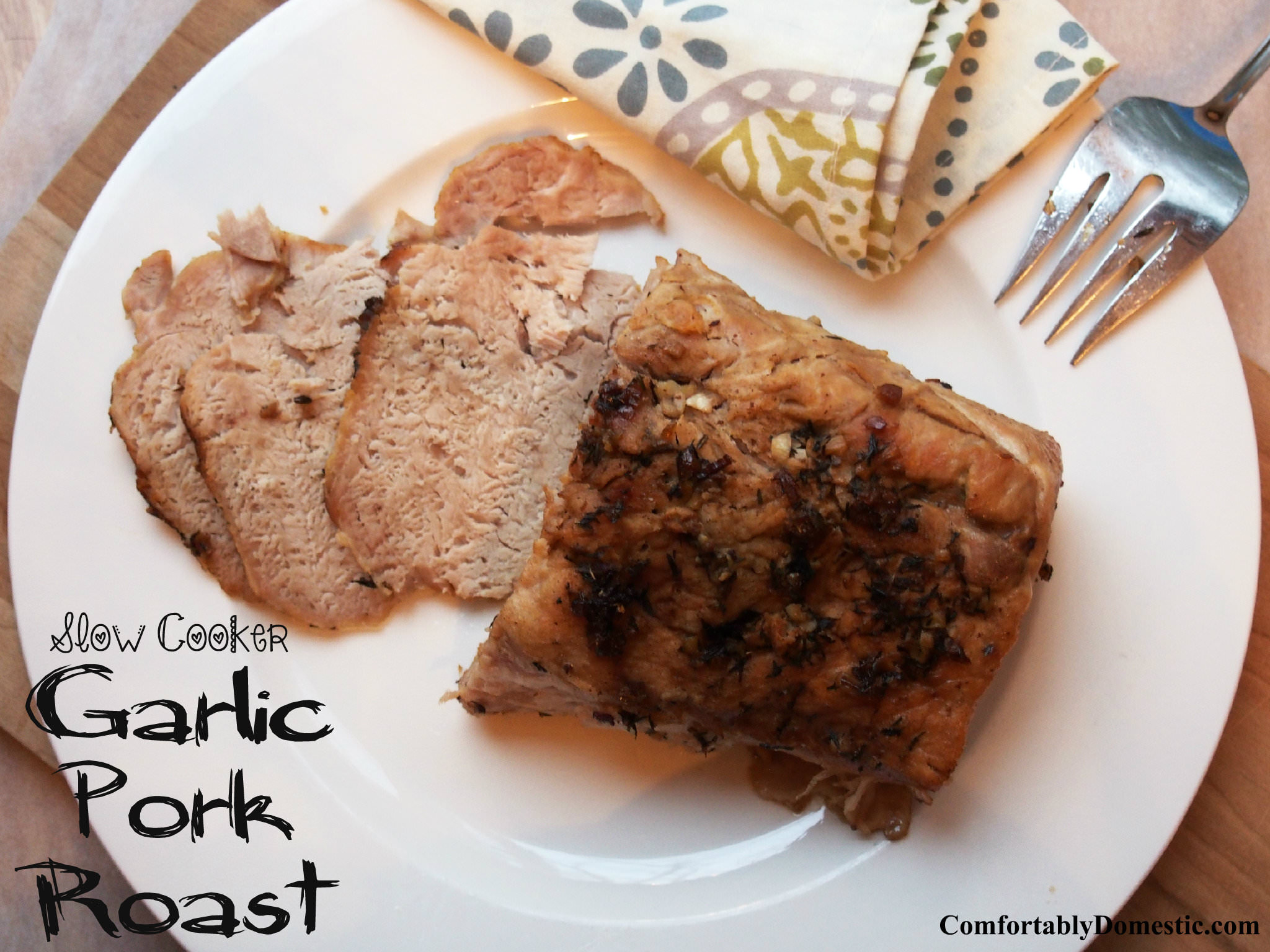 Pork roast made in a slow cooker is incredibly easy to make. The best part is that two separate meals can be created from this slow cooker garlic pork roast recipe! | ComfortablyDomestic.com
