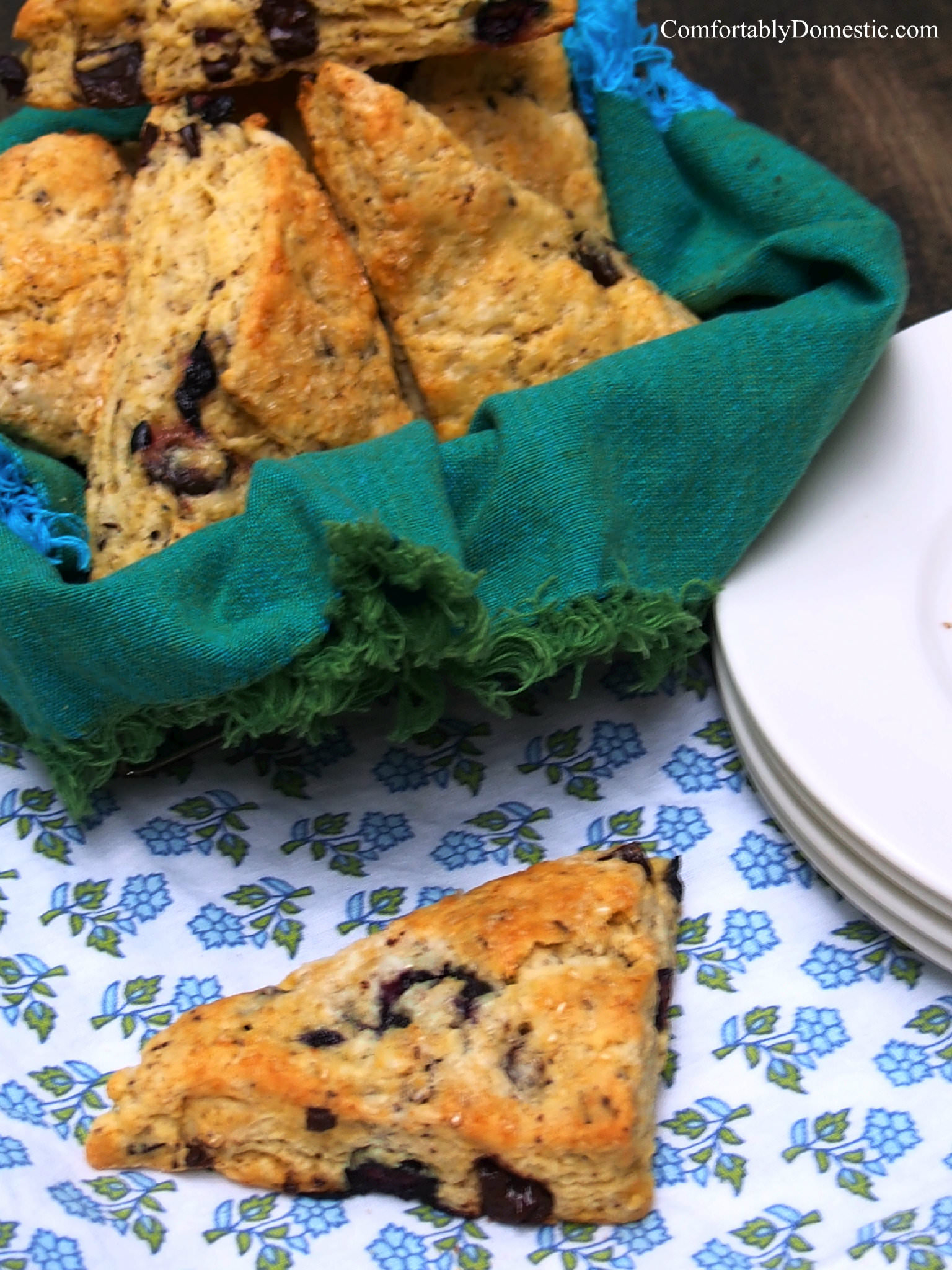 Blueberry scones with dark chocolate are fluffy, buttery breakfast scones, bursting with blueberries and rich chunks of dark chocolate. | ComfortablyDomestic.com