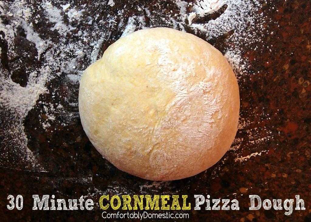 30 Minute Cornmeal Pizza Dough - Cornmeal pizza dough makes homemade pizza crust that’s ready for toppings in 30 minutes, helping you create perfect pizzeria-style pizzas at home! || ComfortablyDomestic.com