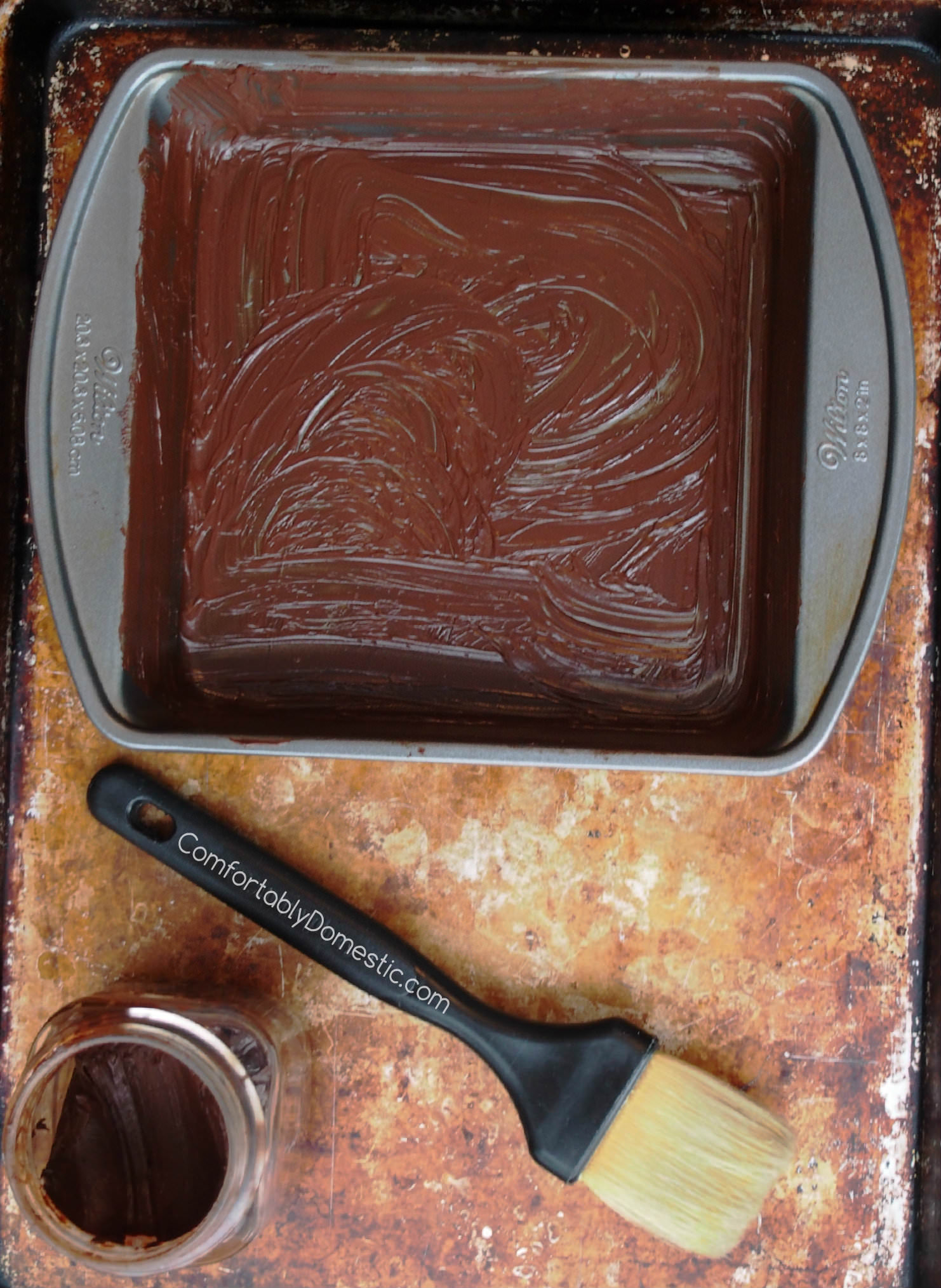 Chocolate Baking Lube is a DIY baking pan release - It inexpensively prepares baking pans to release chocolate baked goods beautifully, keeping them looking every bit chocolate in appearance, with no white residue! | ComfortablyDomestic.com
