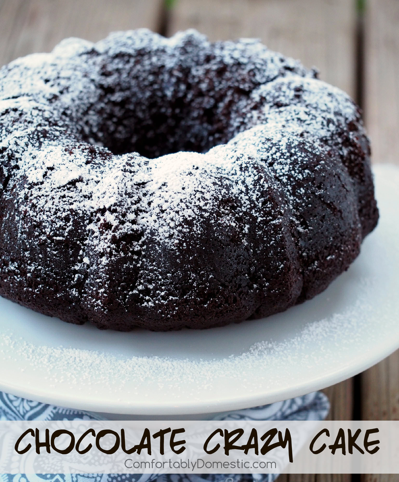 Chocolate Crazy Cake - A sinfully decadent chocolate cake made from scratch that comes together in a jiffy. The recipe is a little crazy because it’s made without eggs, and yet the resulting cake is still rich with a tender crumb. | ComfortablyDomestic.com