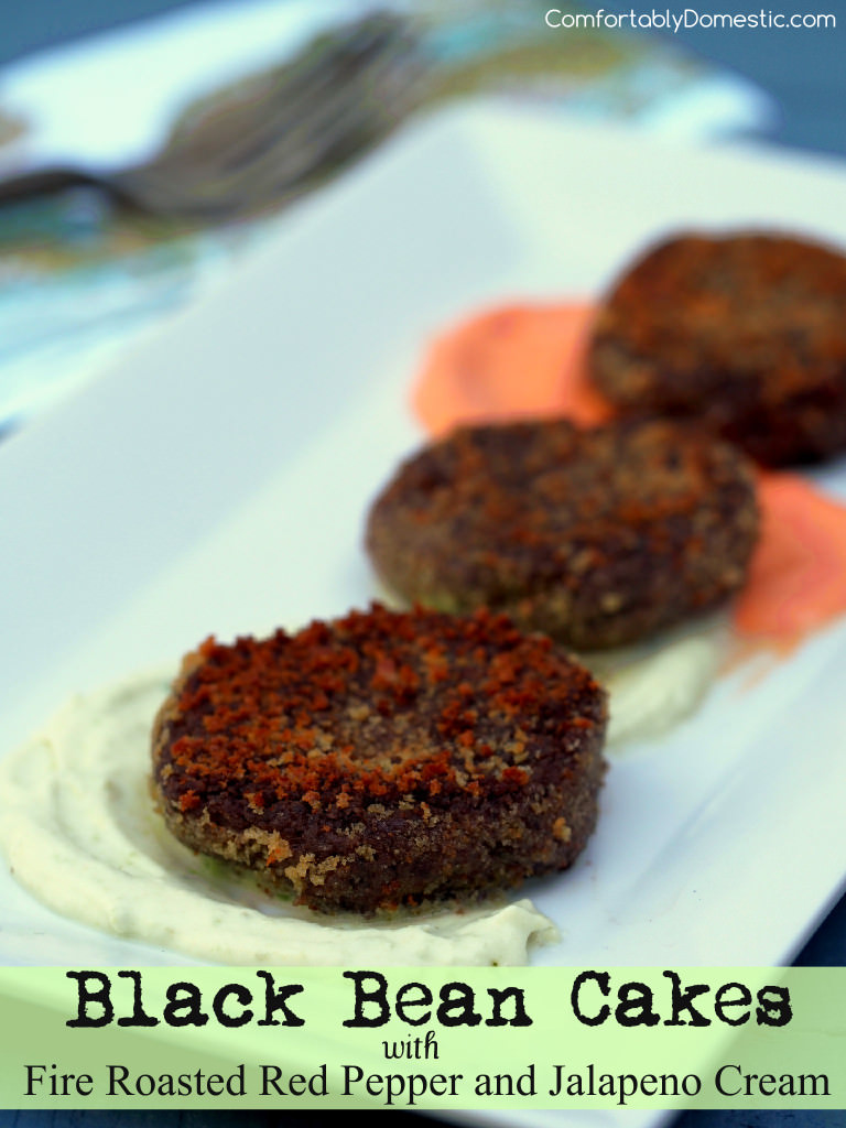 Black bean cakes, crispy exterior, with a silky smooth interior, artfully mingle with fire roasted red pepper and jalapeno cream. | ComfortablyDomestic.com