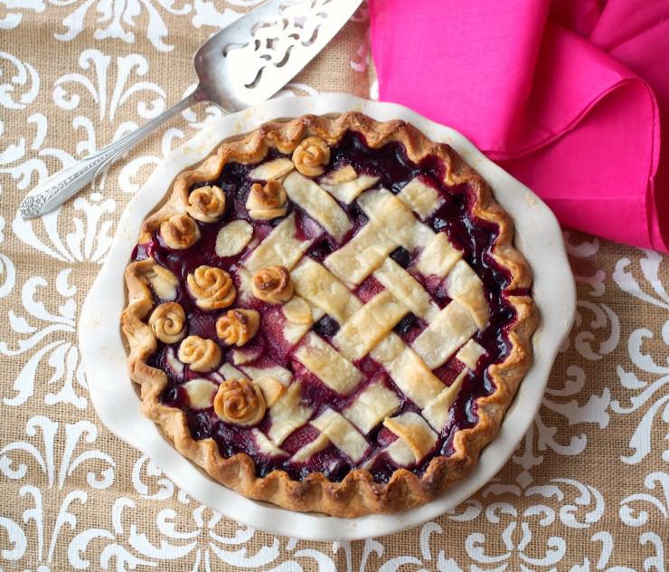 Double-Cherry-Berry-Pie mingles both sweet and tart cherries with wild blueberries and strawberries to give this pie a show stopping flavor that is destined to become a family favorite.