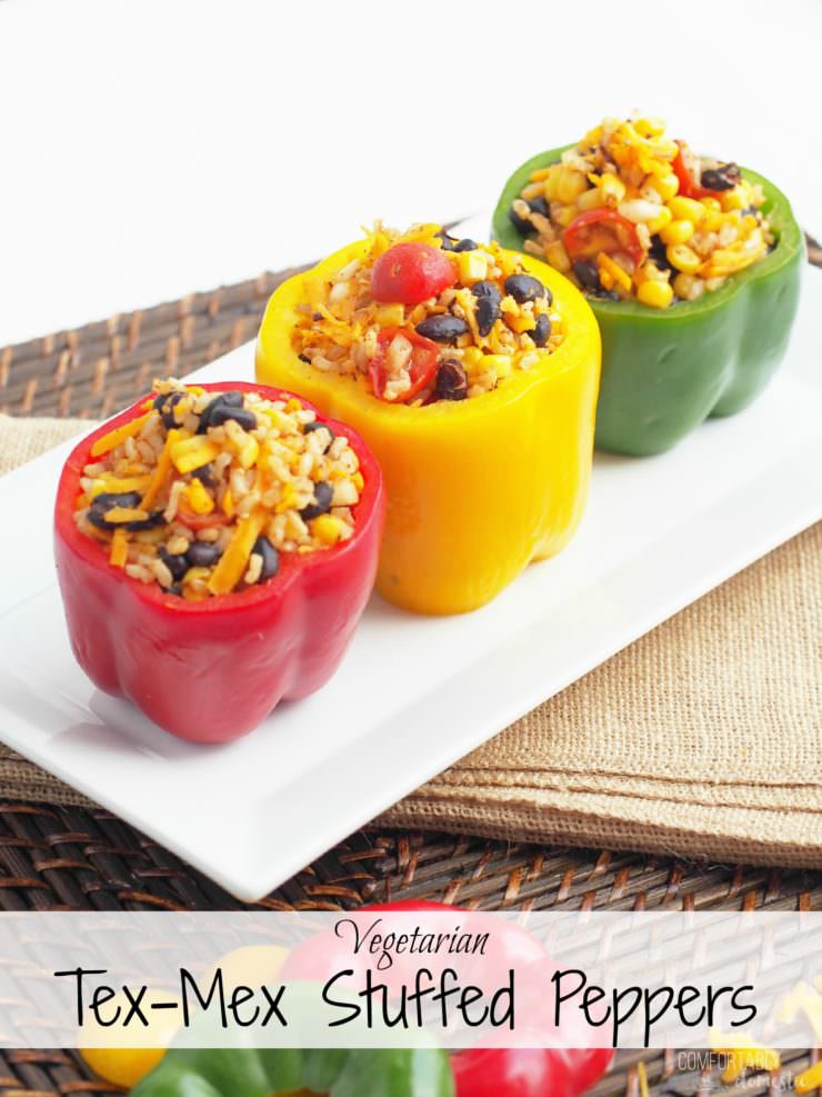 Vegetarian-Stuffed-Peppers-add-Tex-Mex-flavor-to sweet bell peppers filled with a combination of chewy brown rice, tender black beans, garden fresh vegetables, tangy cheese, and blend of southwest seasonings to make these healthy morsels anything but bland or ordinary. 