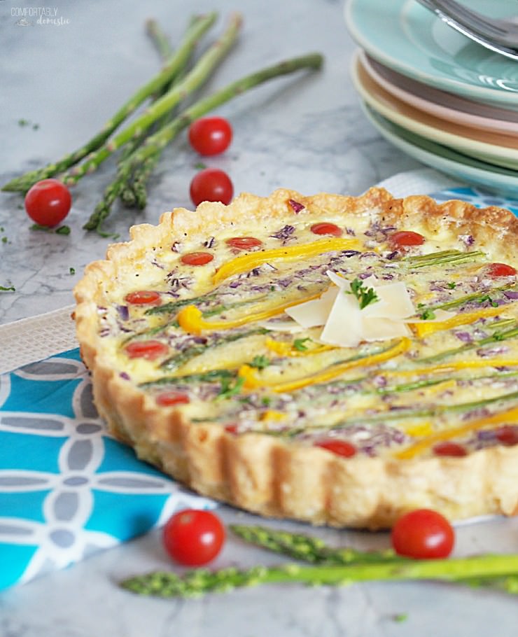 Spring-Vegetable-Tart-is-a-balanced-vegetarian-quiche with loads of fresh spring asparagus, sweet bell peppers, tangy purple onion, fluffy eggs, and creamy cheese nestled in a buttery crust.