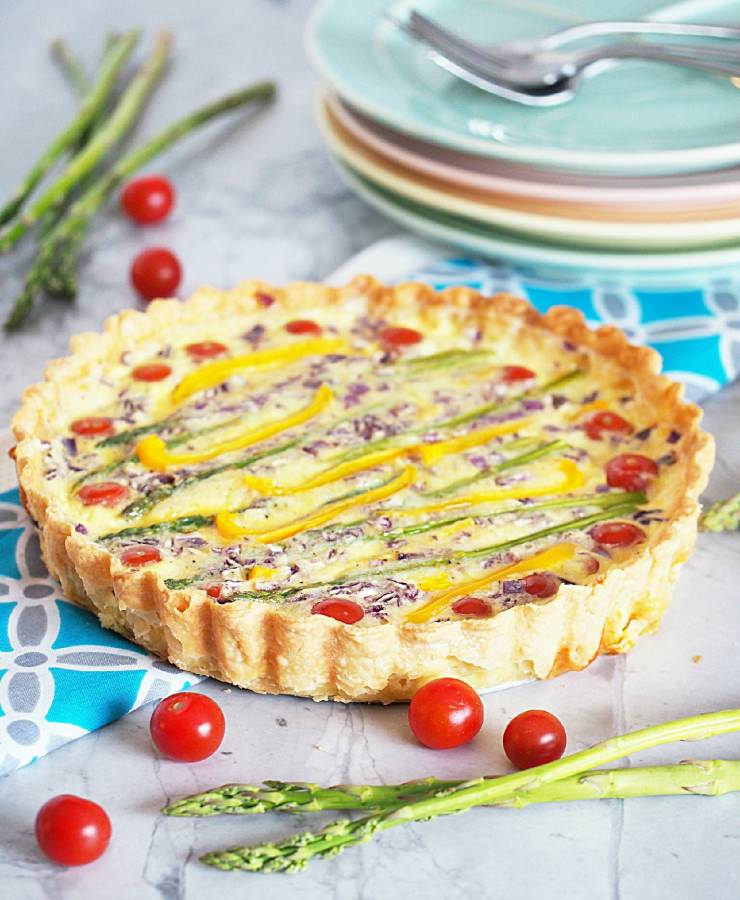 Spring-Vegetable-Tart-is-a-balanced-vegetarian-quiche with loads of fresh spring asparagus, sweet bell peppers, tangy purple onion, fluffy eggs, and creamy cheese nestled in a buttery crust.