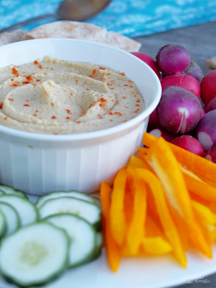 Skinny-Hummus-made-with-yogurt is nice and creamy with a nice bite of garlic—low fat Greek yogurt cuts down on the extra calories found in traditional recipes.