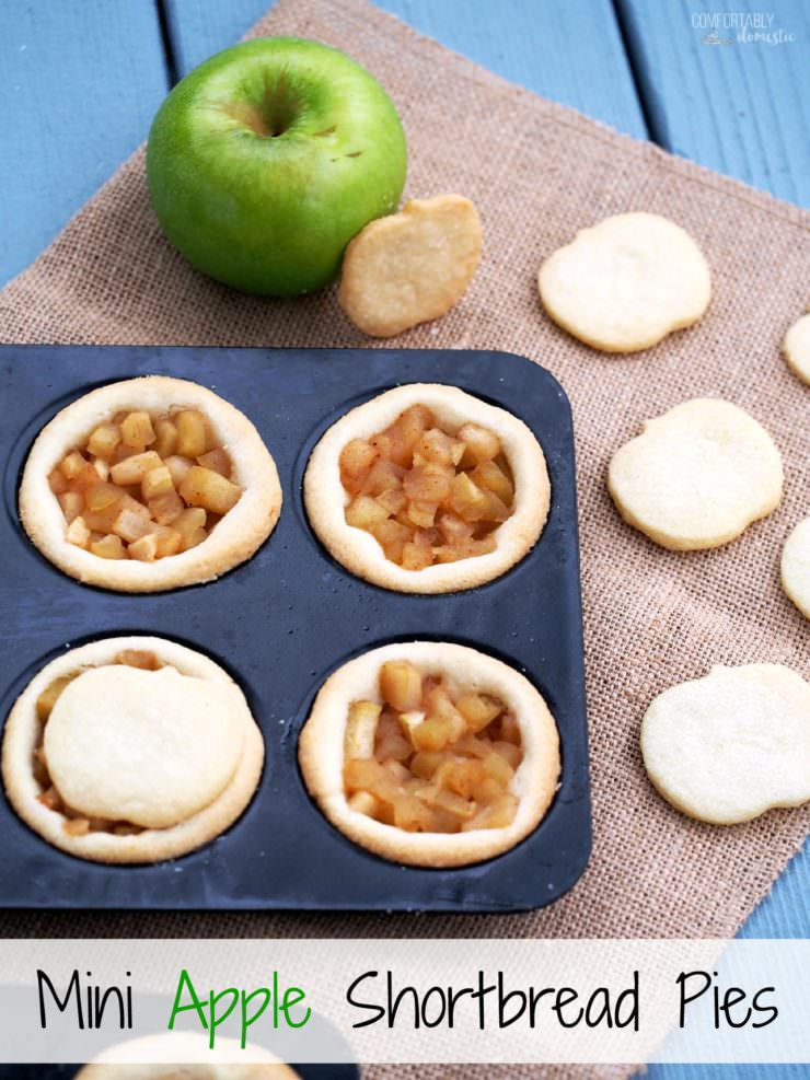 Mini-Apple-Shortbread-Pies marry ripe, juicy apples with cinnamon sugar for a delightful pie filling nestled in a buttery cookie crust. These individual apple pies are full of all the comforts of fall. 