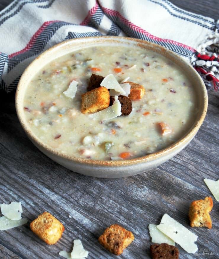 Slow-Cooker-Chicken-Wild-Rice-Soup is a big ol’ bowl of savory comfort on a brisk fall day. Studded with vegetables and chewy wild rice, this creamy soup will warm you from the inside out! 