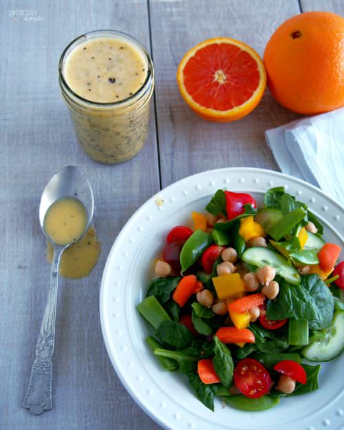 Chopped-Salad-with-Orange-Poppy-Seed-Dressing is a bed of fresh, crunchy vegetables topped with homemade tangy-sweet orange poppy seed dressing is the perfect salad of summer. 