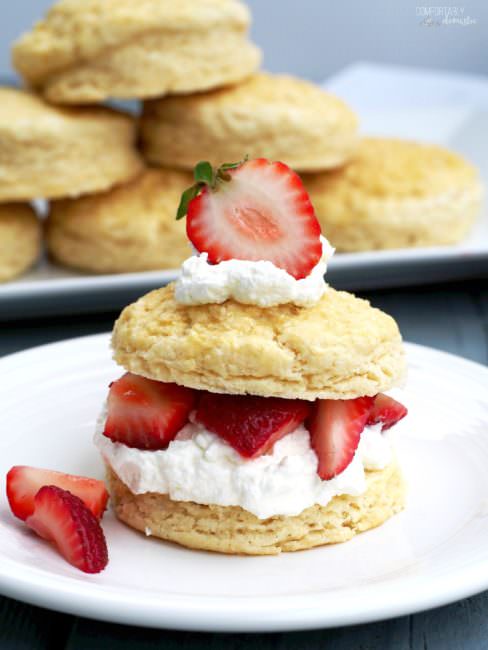 The-Best-Strawberry-Shortcake layers lightly sweetened whipped cream between sweet and buttery biscuits, and top it with sweet, ripe strawberries for a classic summer time dessert.