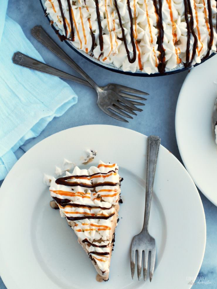 Mocha-Cappuccino-Ice-Cream-Pie is a winning, no bake summer dessert! This decadent pie is comprised of coffee ice cream, chocolate chips, sweetened whipped cream, drizzles of caramel and hot fudge, nestled in an Oreo cookie crust.