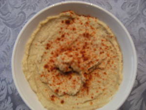 Mediterranean hummus is a spread made from garbanzo beans (chickpeas) and tahini. It's a healthy snack dip that's delicious warm or cold! - Get the recipe on ComfortablyDomestic.com