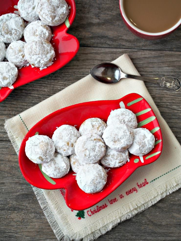 Pfeffernusse-Spiced-Snowball-Cookies are traditional European snowball cookies, crunchy and robustly spiced. Despite the literal "pepper nuts" translation of the name, these tasty holiday cookies are nut free!