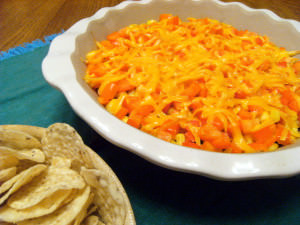 Layered Taco Dip is one of our family's favorite easy appetizers! Recipe on ComfortablyDomestic.com