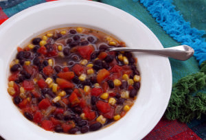 This spicy black bean soup recipe is quick and easy to make, so it's the perfect weeknight meal. Hearty and delicious, too! | ComfortablyDomestic.com