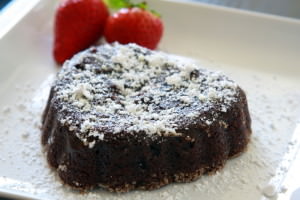 Molten chocolate lava cake is a rich, decadent dessert, perfect for any special occasion. This cake is heart shaped, making it a perfect Valentine's Day dessert! | ComfortablyDomestic.com