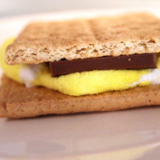 Marshmallow Peeps, graham crackers, and milk chocolate combine to create a delicious and fun Easter treat. Marshmallow Peeps s'mores! | ComfortablyDomestic.com