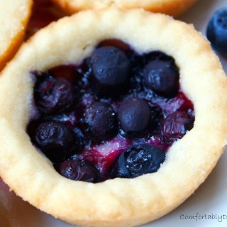 Blueberry shortbread pies are bite sized shortbread, bursting with sweet blueberry filling. They're a taste of summer any time of the year. | ComfortablyDomestic.com