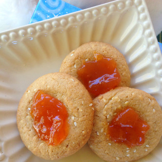 Look here for the delicious and easy cookie recipes being shared for the 4th day of Cookie Week 2012! Colossal cookies and sesame plum thumbprint cookies!