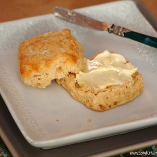 Whole Wheat Buttermilk Biscuits are flaky, buttery biscuits, filled with whole grain goodness. Perfect for breakfast sandwiches or with a meal. | ComfortablyDomestic.com