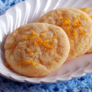 Lemon Doodles are the perfect balance between a chewy, light lemon cookie and soft lemon cake. Tangy and sweet, with a crunchy lemon sugar topping, these cookies are the ultimate treat! | ComfortablyDomestic.com