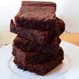 One bowl fudge brownies are possible! Warm, gooey, chocolate fudge brownies made from scratch, in the same time it takes to make them from a boxed mix! | ComfortablyDomestic.com