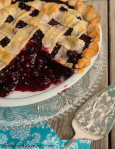 Perfect Blueberry Pie | ComfortablyDomestic.com | The BEST blueberry pie has juicy blueberries, a little lemon, and sugar nestled in a flaky all butter crust.