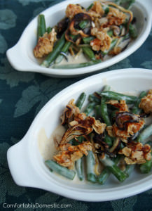 This green bean casserole recipe has NO condensed soup, and is made entirely from scratch! Covered with crisp onions and a savory cheese streusel topping. | ComfortablyDomestic.com