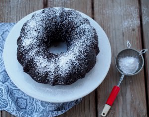 Chocolate Crazy Cake - A sinfully decadent chocolate cake made from scratch that comes together in a jiffy. The recipe is a little crazy because it’s made without eggs, and yet the resulting cake is still rich with a tender crumb.| ComfortablyDomestic.com
