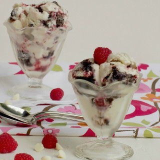 White Chocolate Raspberry Brownie Ice Cream - White chocolate flavored ice cream, swirled with tangy raspberry ribbons and chunks of fudge brownies makes this delicious frozen treat. | Comfortably Domestic