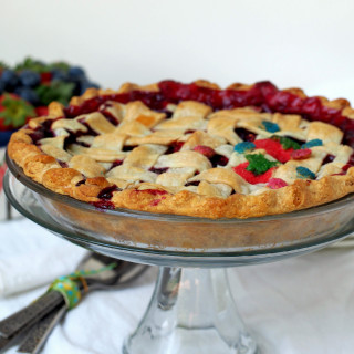 Mixed-Berry-Triple-Berry-Pie - Fresh, sweet strawberries, juicy blueberries, and tart raspberries happily mingle in this mixed berry pie that is as delightfully inviting as summer itself. | ComfortablyDomestic.com