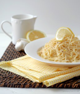 Easy lemon cream pasta is delicate angel hair pasta, bathed in lemony cream sauce. It's simple enough for busy weeknights, but luxurious enough for easy entertaining. | ComfortablyDomestic.com