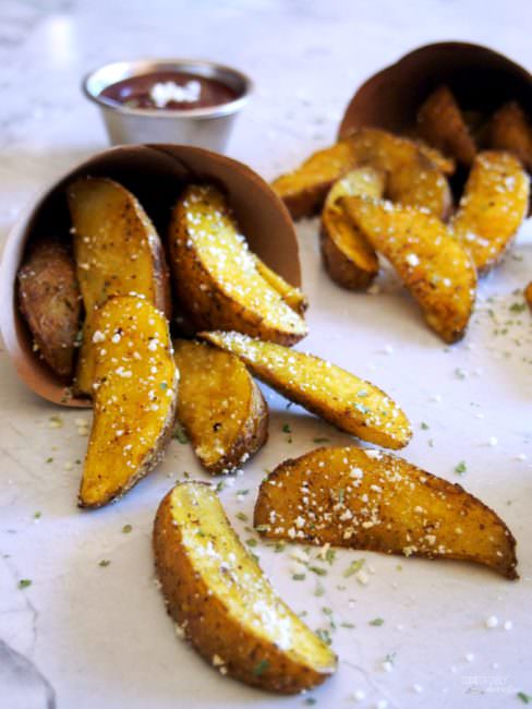 Baked-Potato-Wedges-Steak-Fries are perfectly seasoned bites of fluffy pub-style steak fries to compliment most any meal.