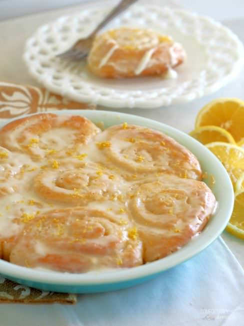 Lemon Sweet Rolls are sliced, soft sweet bread rolled into pinwheels with a buttery, lemon sugar filling and topped with a zesty lemon cream cheese icing.