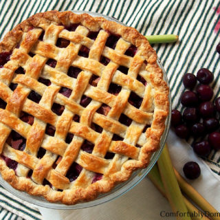 Sweet Cherry Rhubarb Pie marries plump sweet cherries with tart rhubarb for a juicy pie that’s bursting with summer sunshine in every bite.